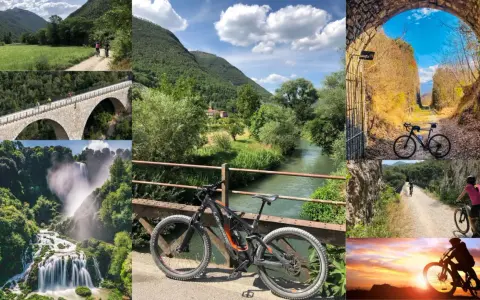 Ciclisti sul **Spoleto Norcia trail**: ponti, cascate, tunnel e panorami mozzafiato.